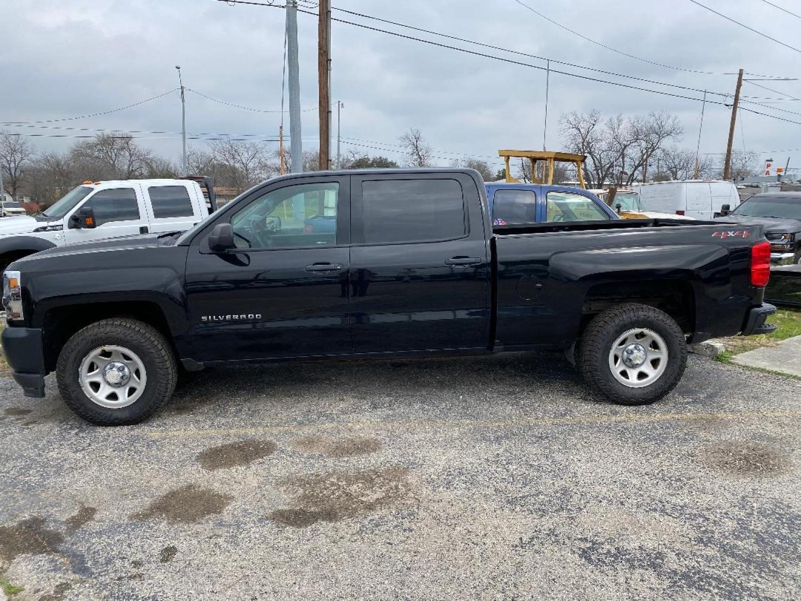2018 Black Chevrolet Silverado 1500 LS Crew Cab Long Box 4WD (3GCUKNEC6JG) with an 5.3L V8 OHV 16V engine, 6A transmission, located at 1687 Business 35 S, New Braunfels, TX, 78130, (830) 625-7159, 29.655487, -98.051491 - Photo #1